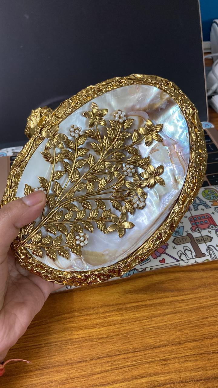 PREMIUM brass mother of pearl oval clutch with stone work
