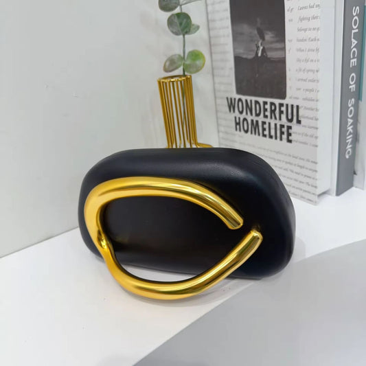 Signature Drop curve handy clutch bag