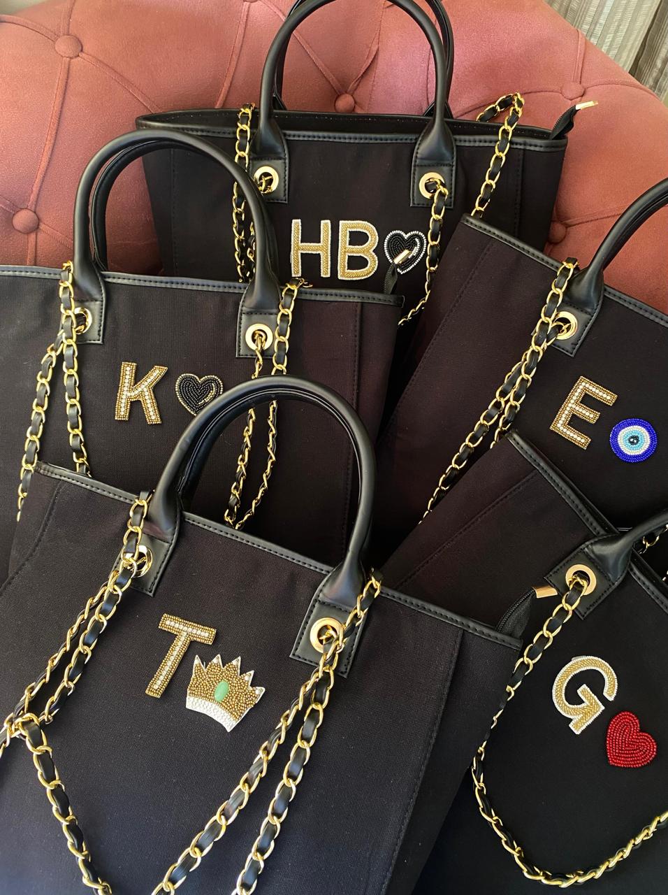 Black canvas tote bag with Crown charm