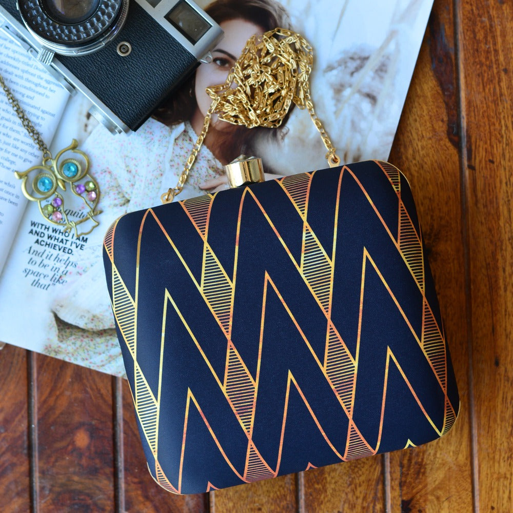 Blue printed fabric clutch with golden work