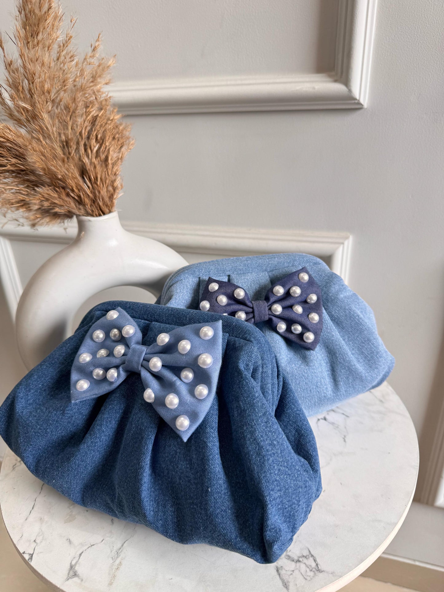 Denim cloud clutch bag with BOW