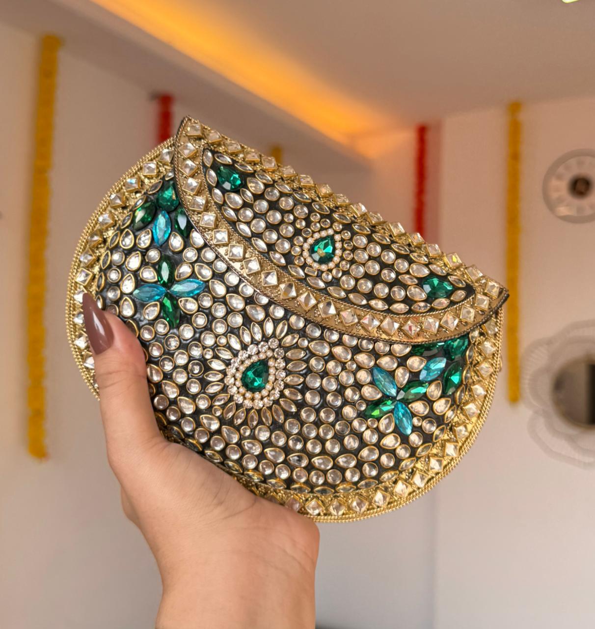RAJSI rhinestone kundan work brass clutch