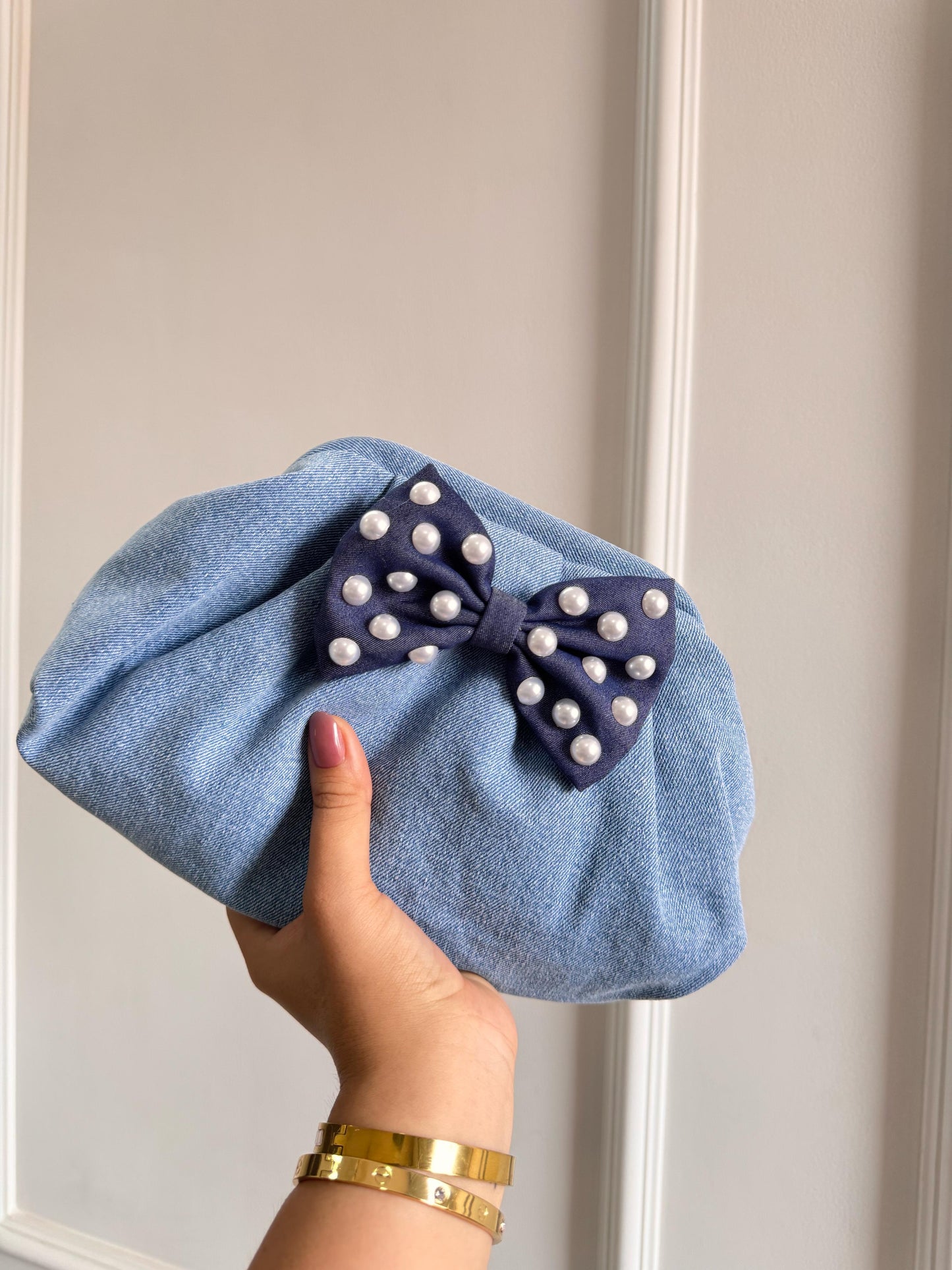 Denim cloud clutch bag with BOW
