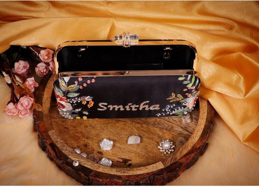 Black floral customised handwork on printed clutch