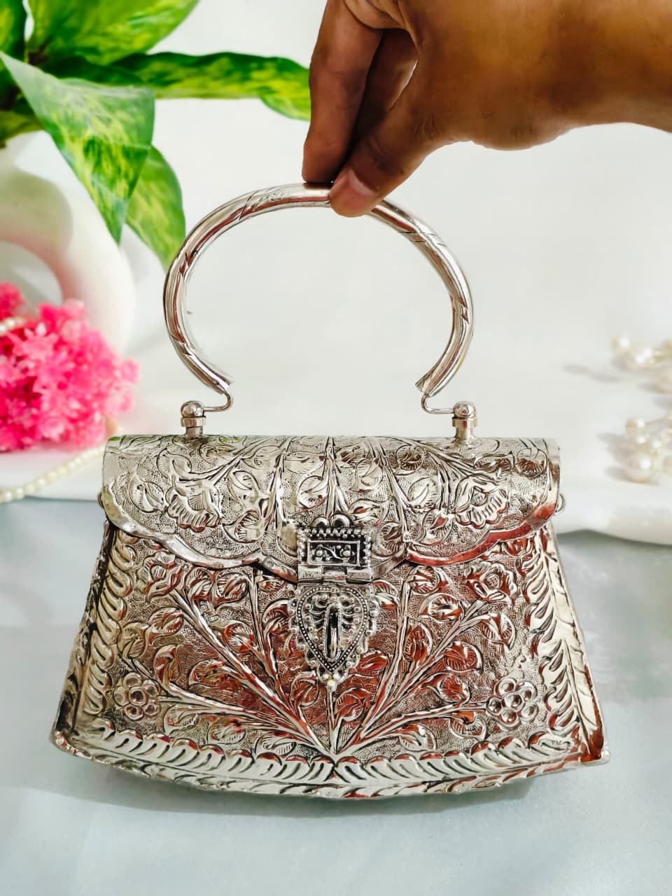 Silver brass clutch bag