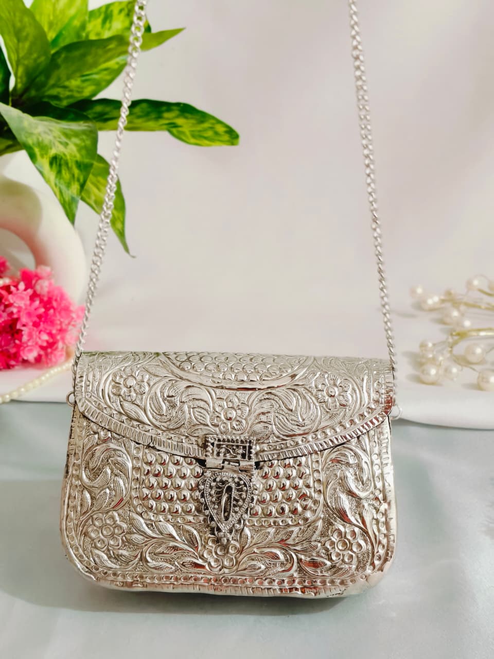 Silver brass clutch bag
