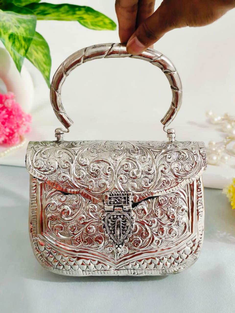 Silver brass clutch bag