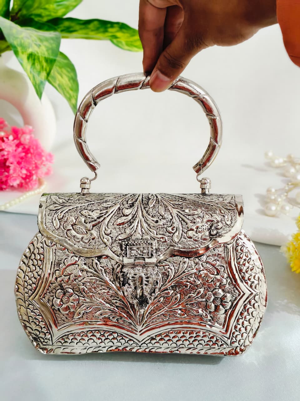 Silver brass clutch bag