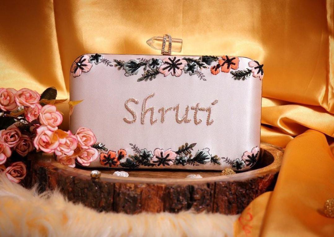 Light pink classy customised handwork on printed clutch