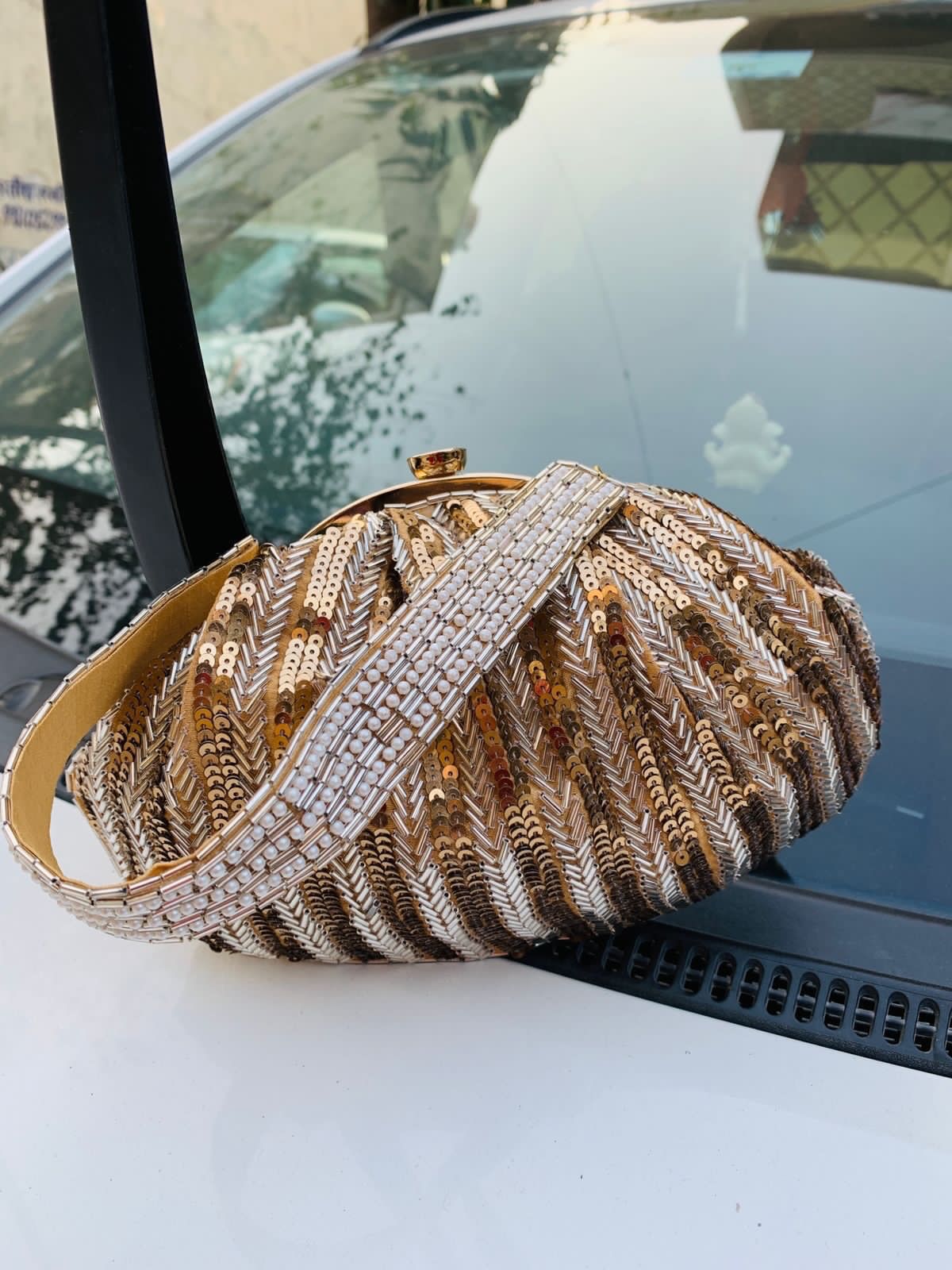 Golden sequins with silver piping batua clutch