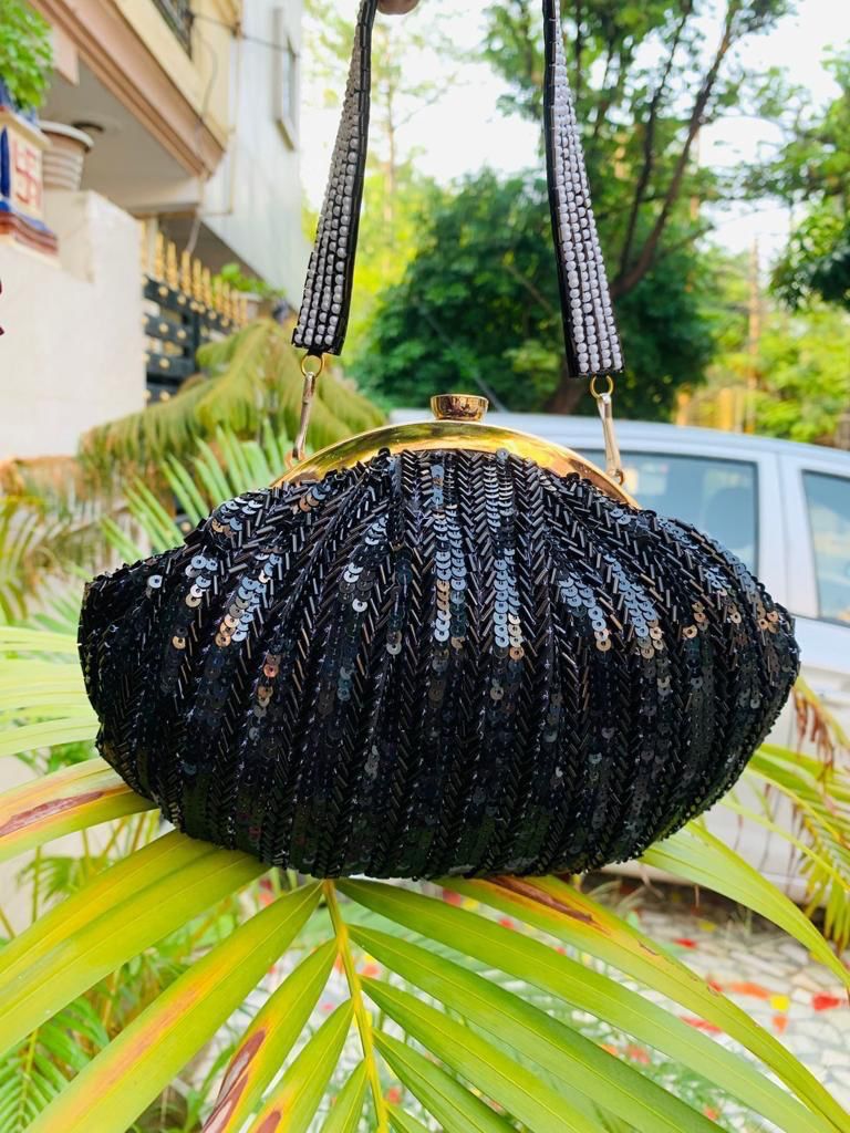 Black shimmer beauty sequins batua clutch