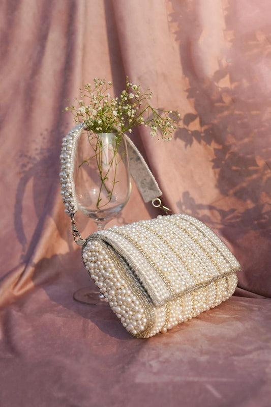 Celebrity edition pearl work wristlet flap clutch