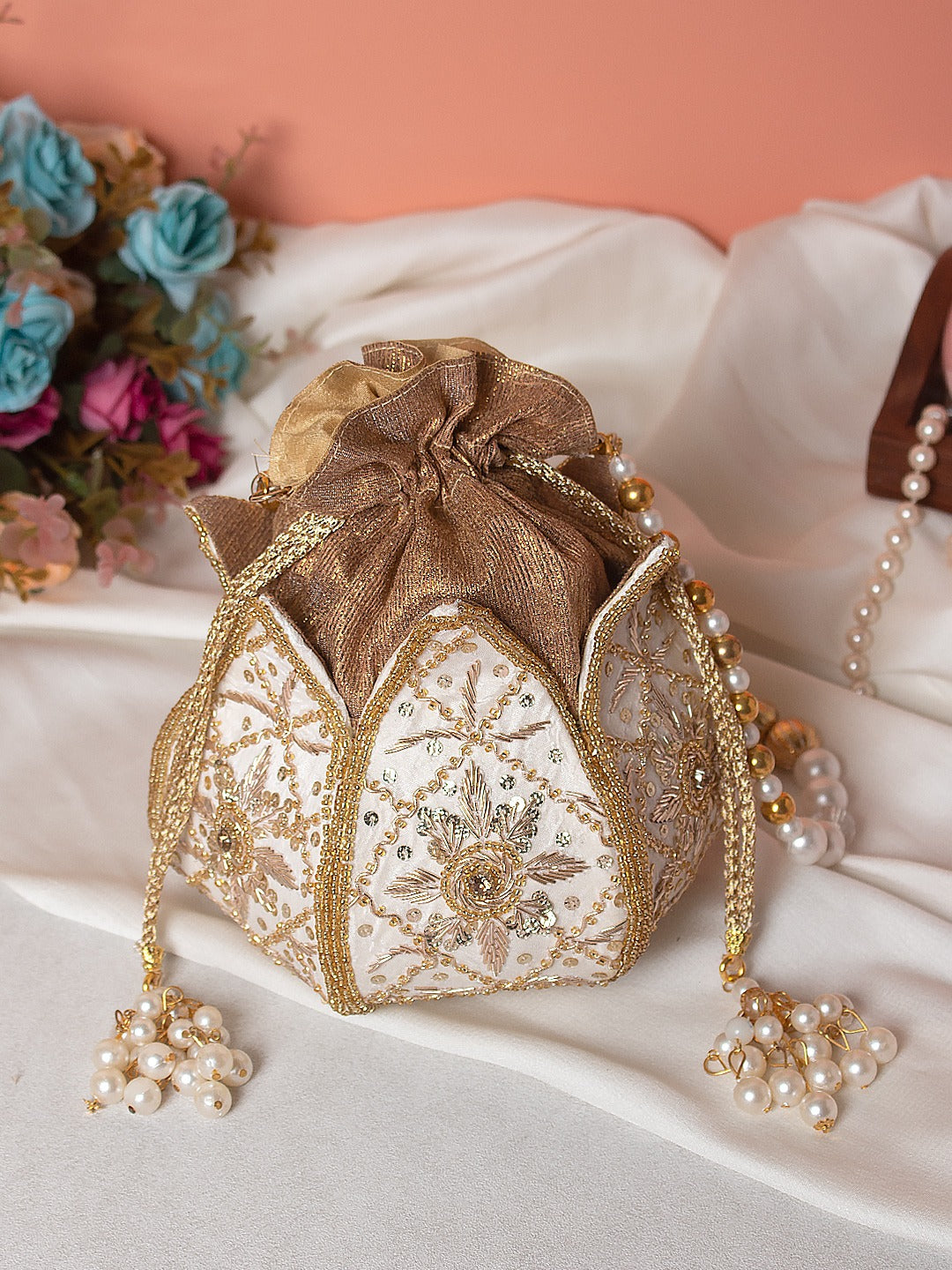 Lotus shape fabric potli in pastel hues