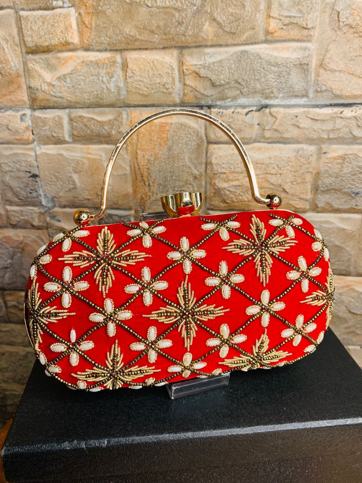 Oval embroidered clutch with golden handle & bead work
