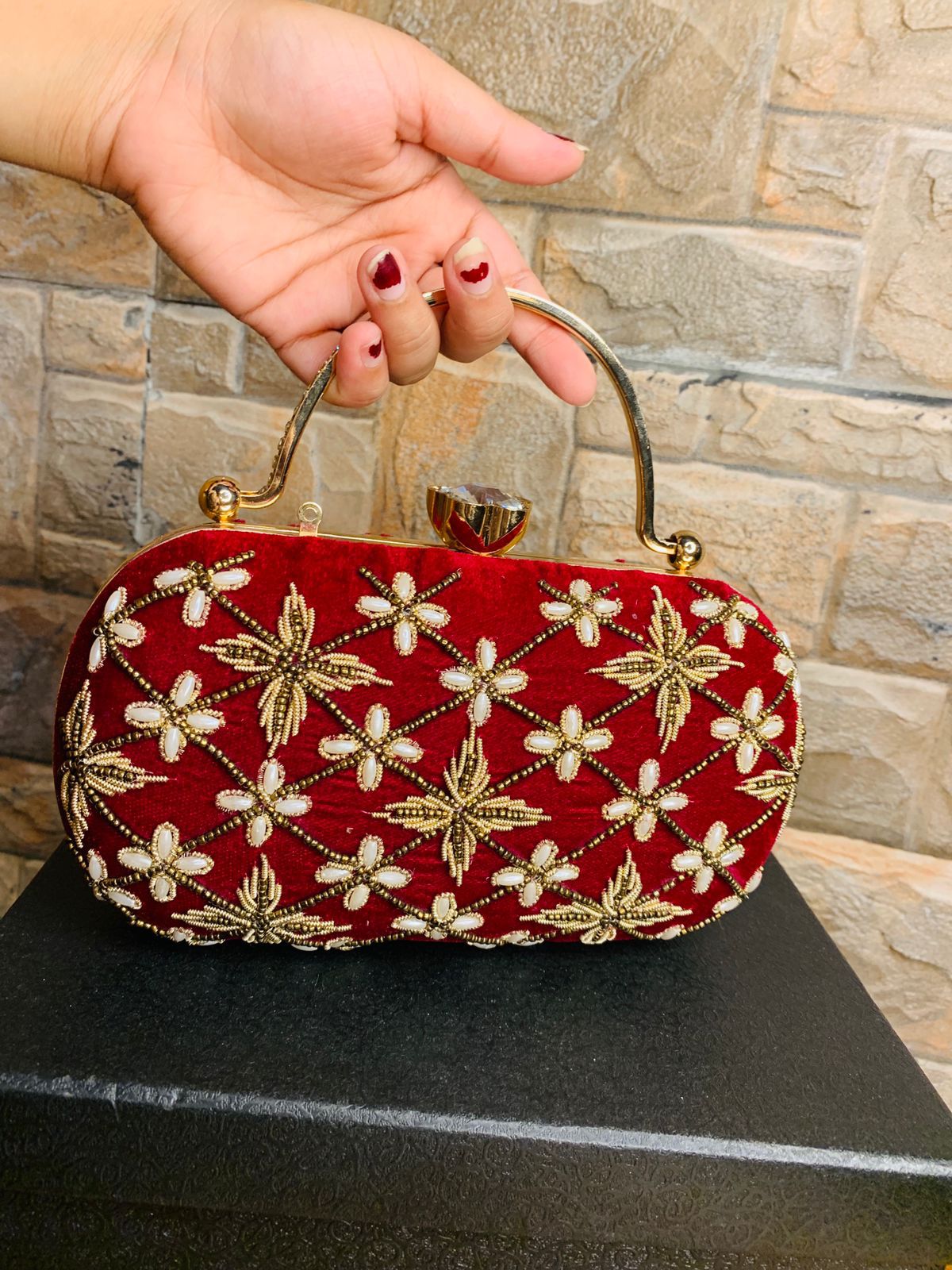 Oval embroidered clutch with golden handle & bead work