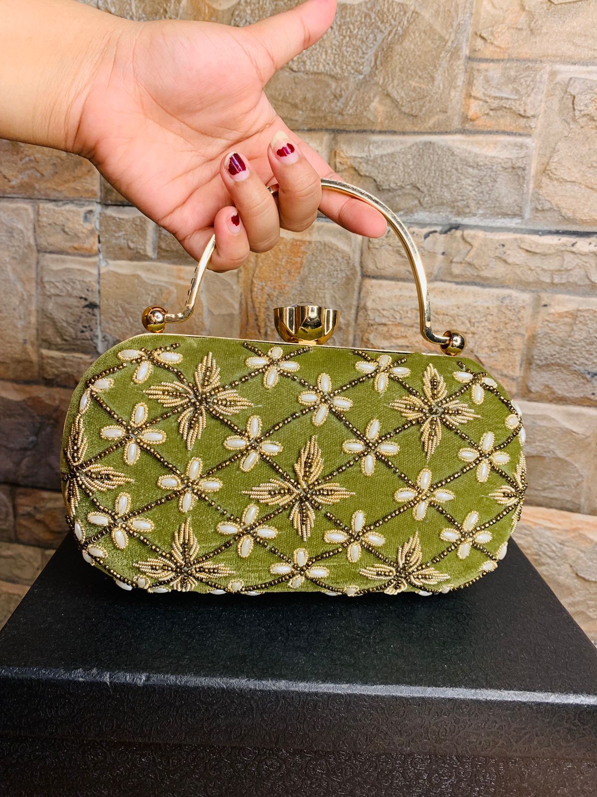 Oval embroidered clutch with golden handle & bead work