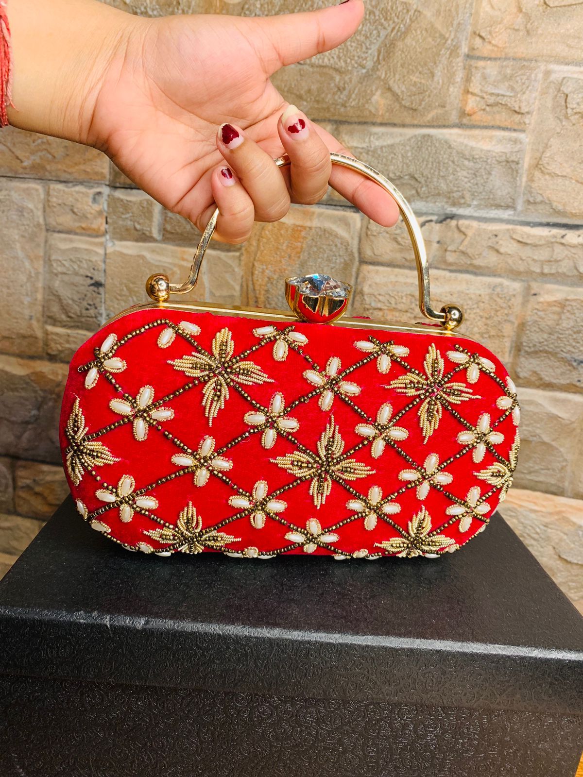 Oval embroidered clutch with golden handle & bead work
