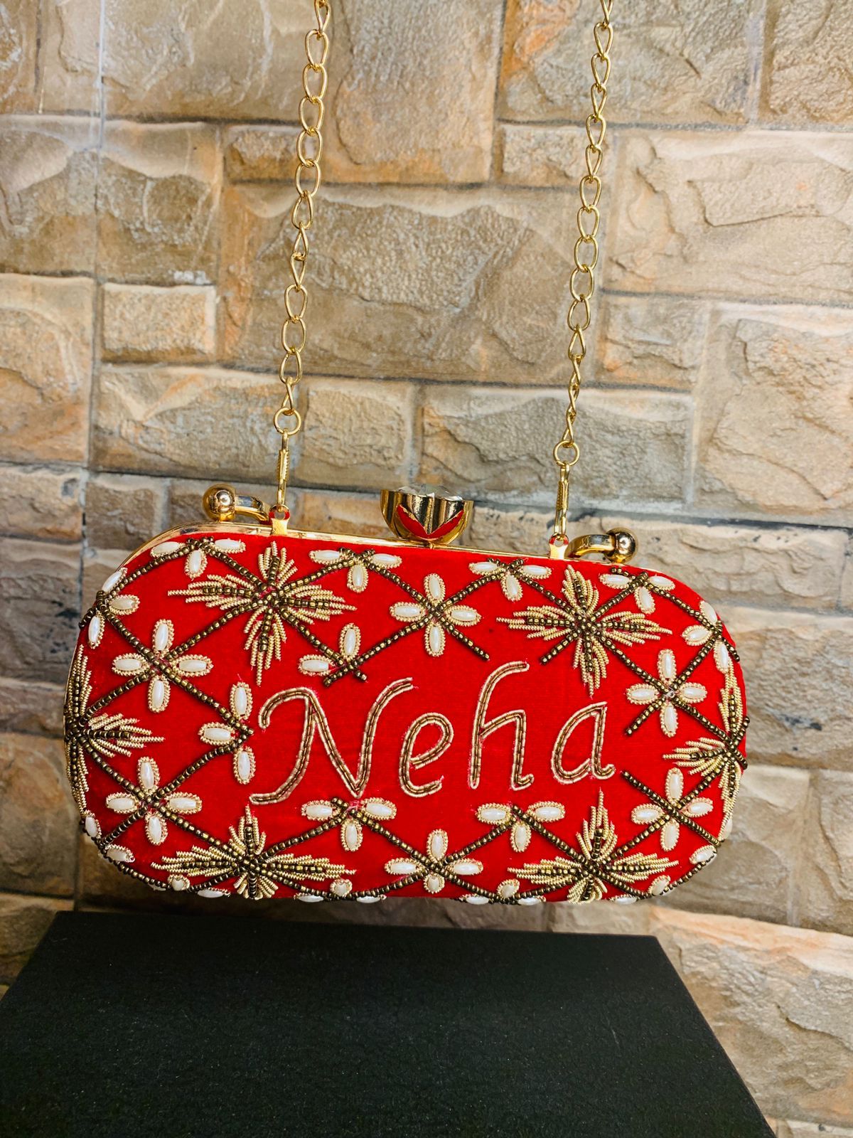 Oval embroidered clutch with golden handle & bead work