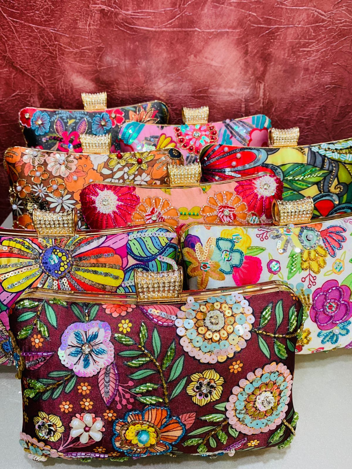 Multi color printed clutch with embroidery work