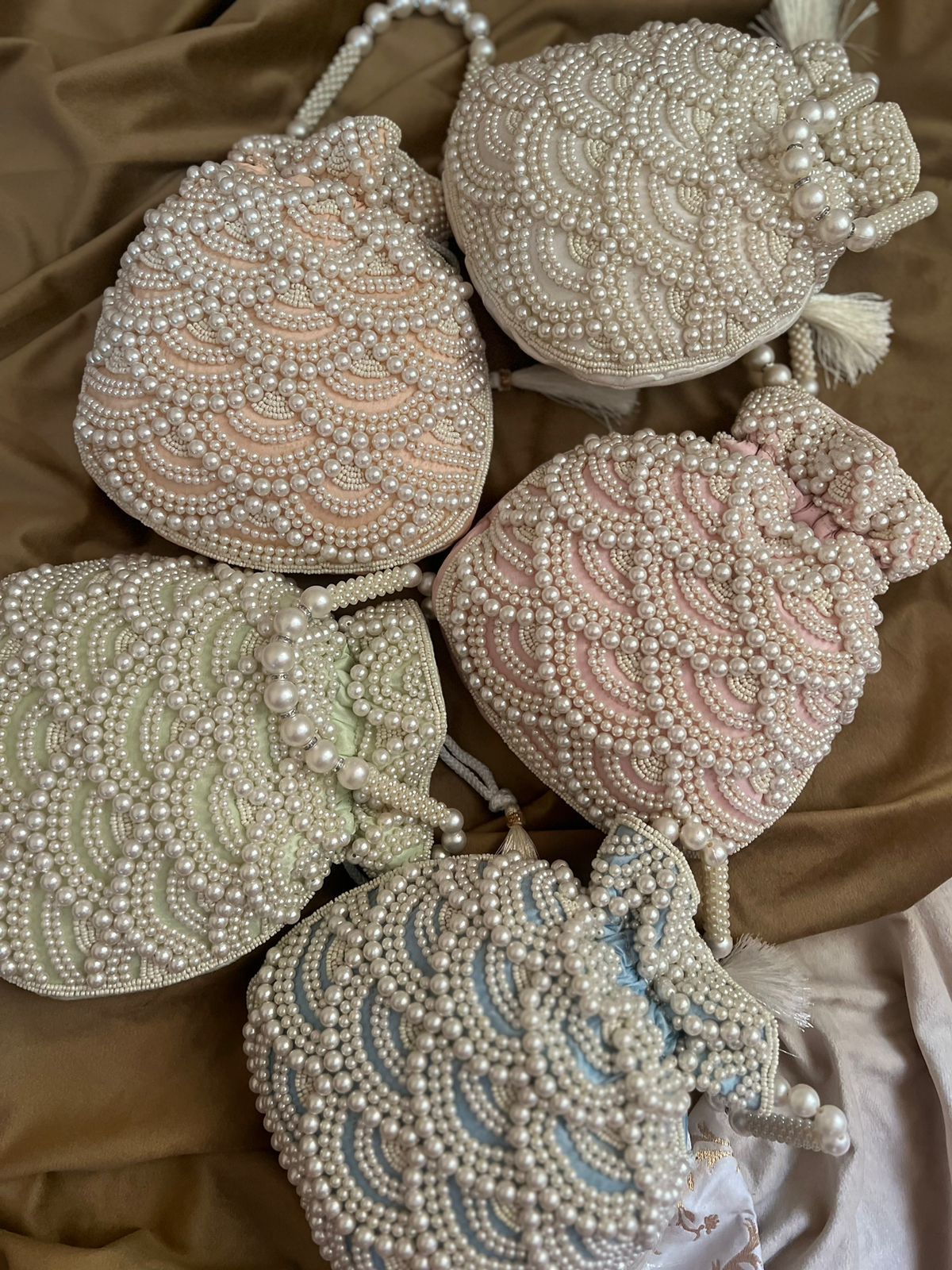 Pastel bead work potli with pearl handle