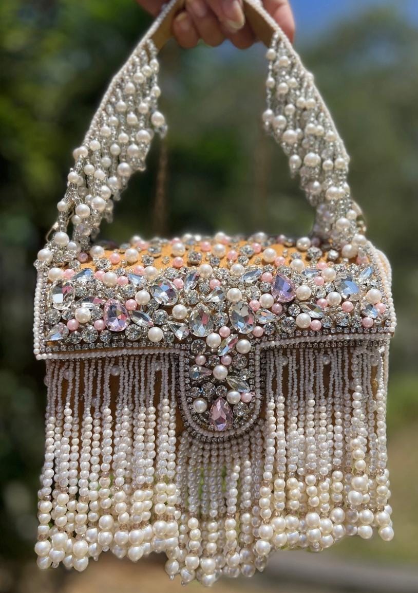 Celebrity edition mesmerizing flap clutch with matching handle