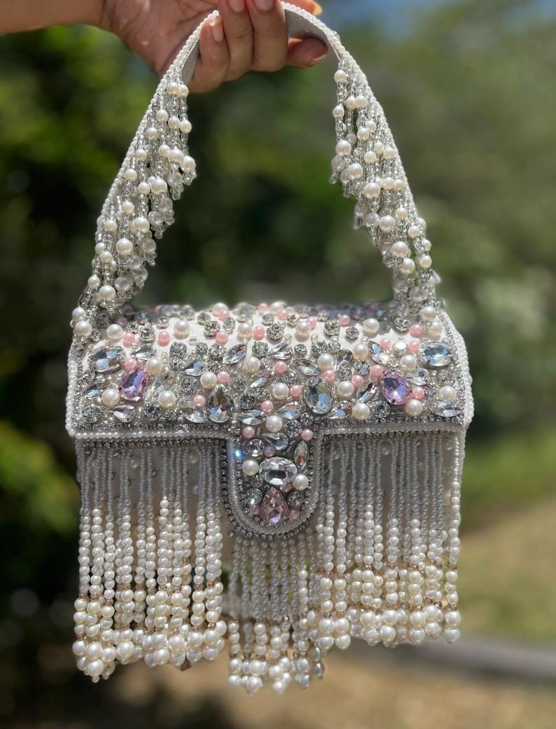 Celebrity edition mesmerizing flap clutch with matching handle