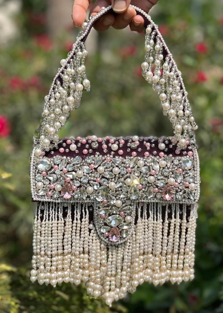 Celebrity edition mesmerizing flap clutch with matching handle