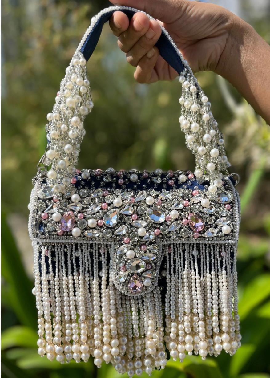 Celebrity edition mesmerizing flap clutch with matching handle