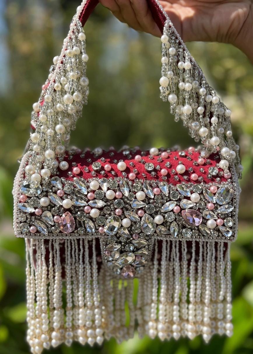Celebrity edition mesmerizing flap clutch with matching handle