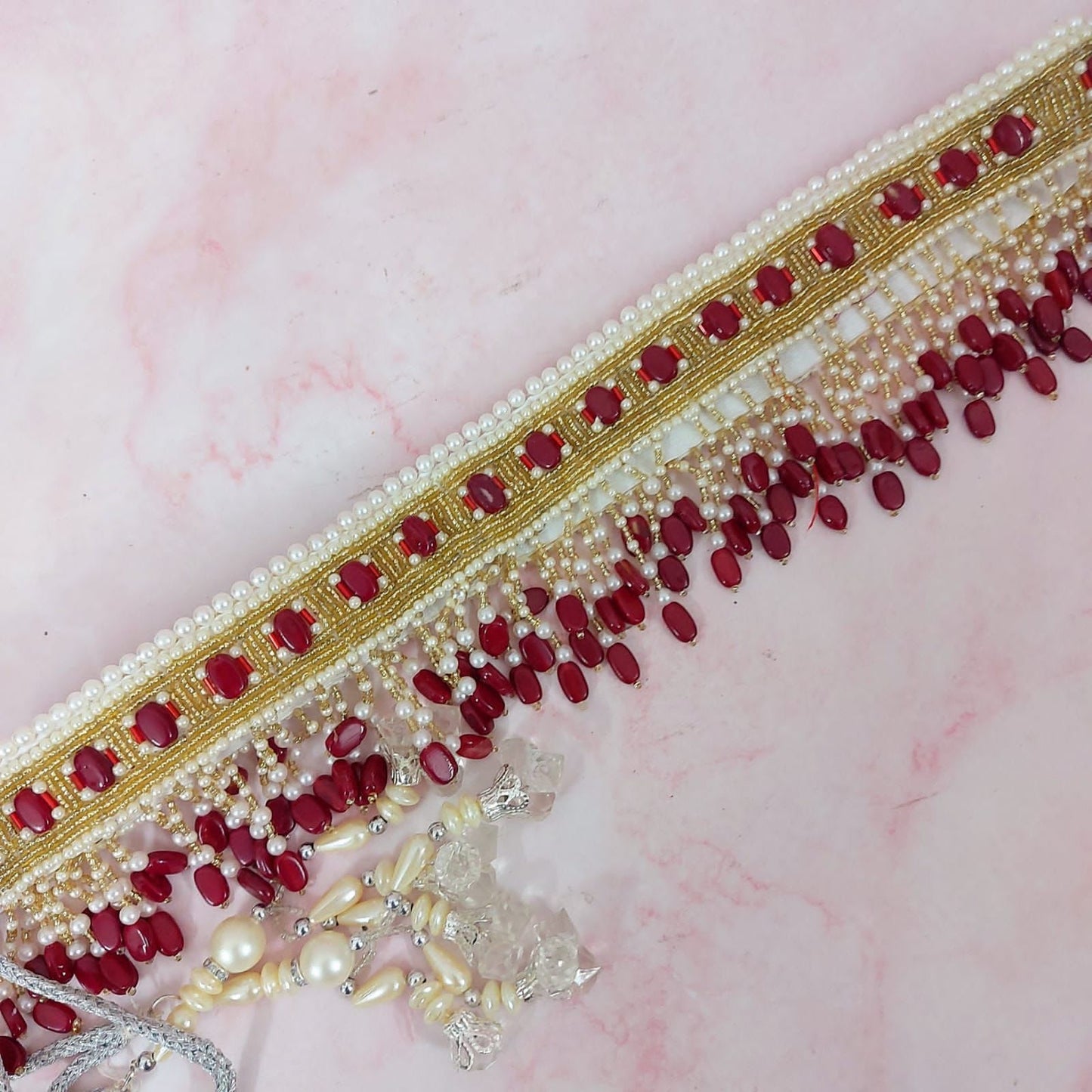 White waistbelt with golden and pink bead work