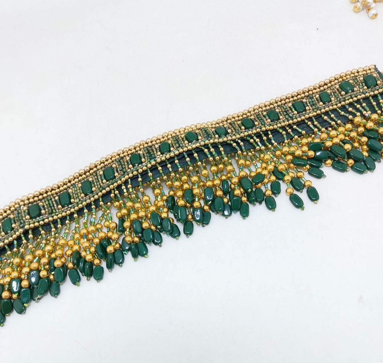 Emerald green waistbelt with golden bead work