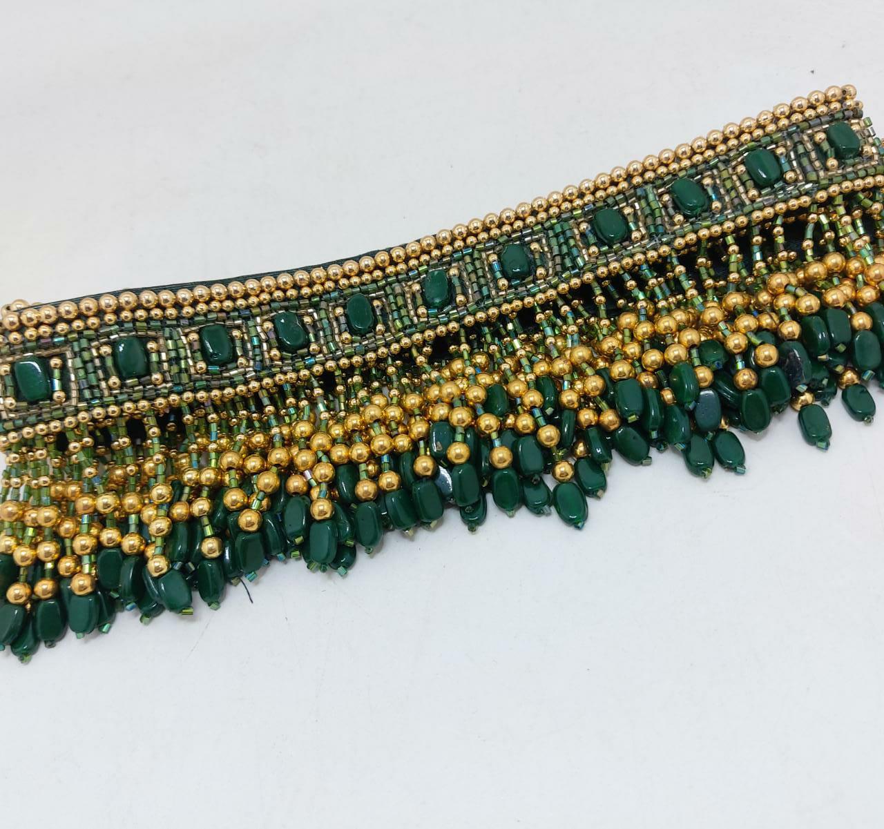 Emerald green waistbelt with golden bead work