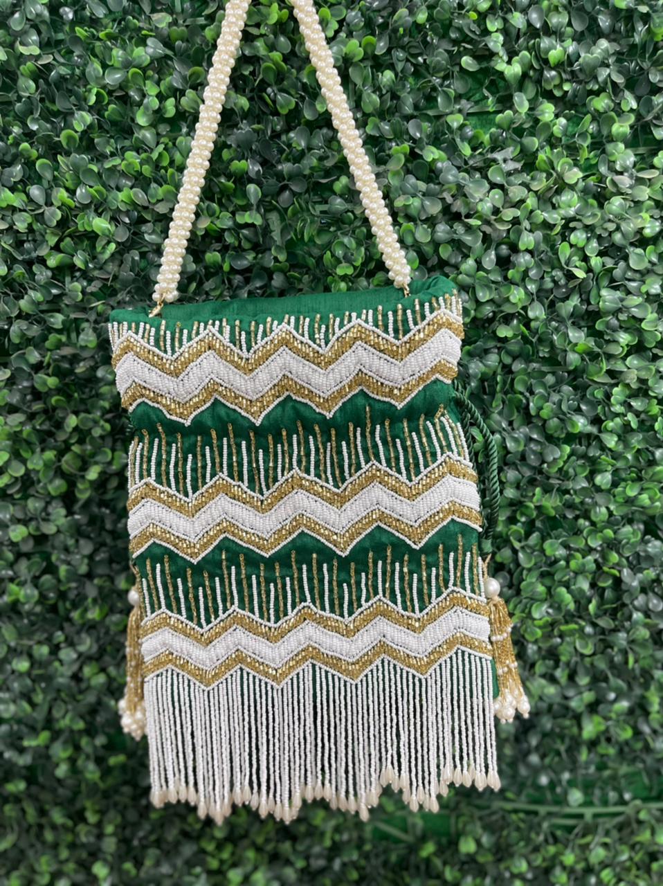 Bead work potli bag with pearl tassels