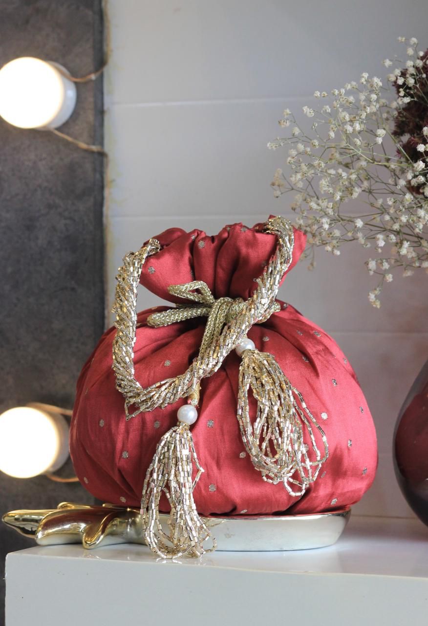 Shimmer matka potlis with pearl handle