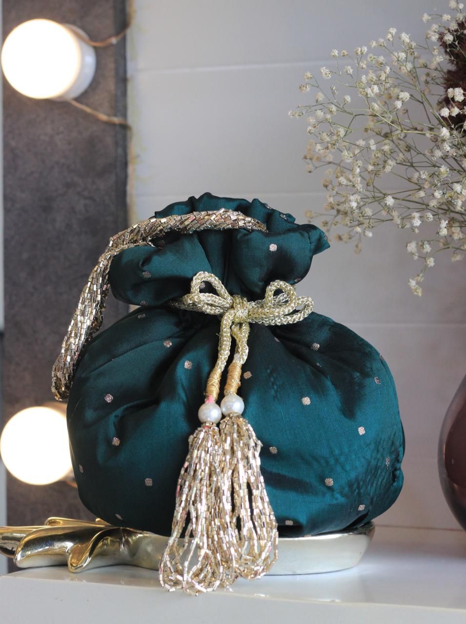 Shimmer matka potlis with pearl handle