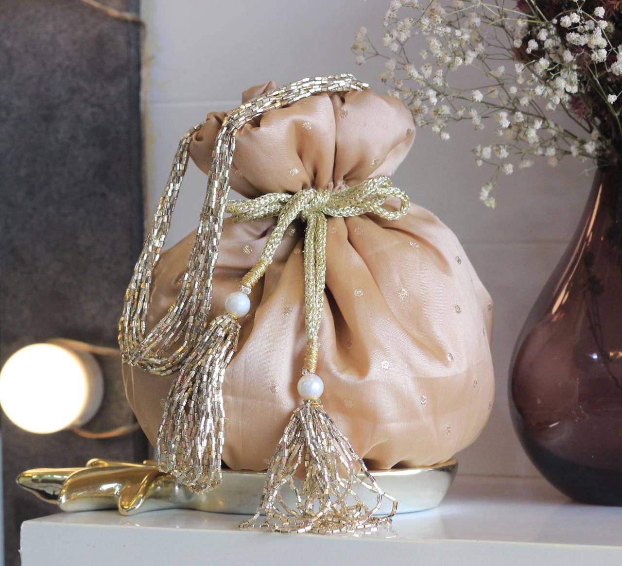 Shimmer matka potlis with pearl handle