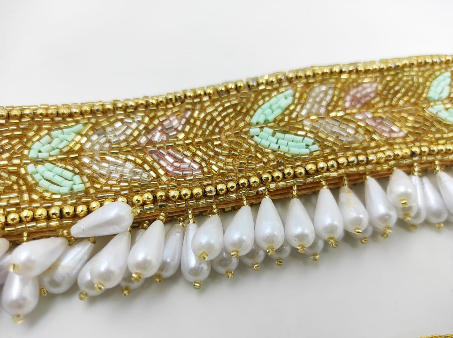 Golden waistbelt with white pearl drop dangles