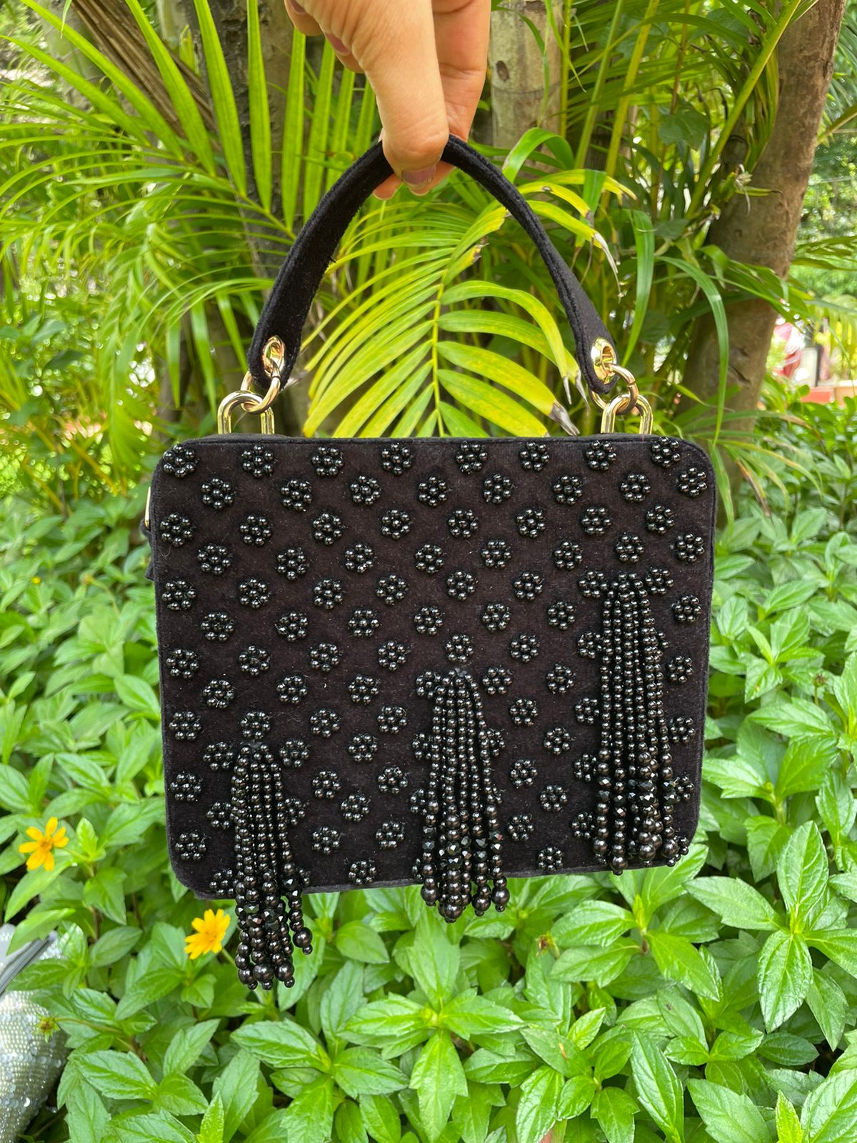 Suede suitcase handbag with hanging pearls