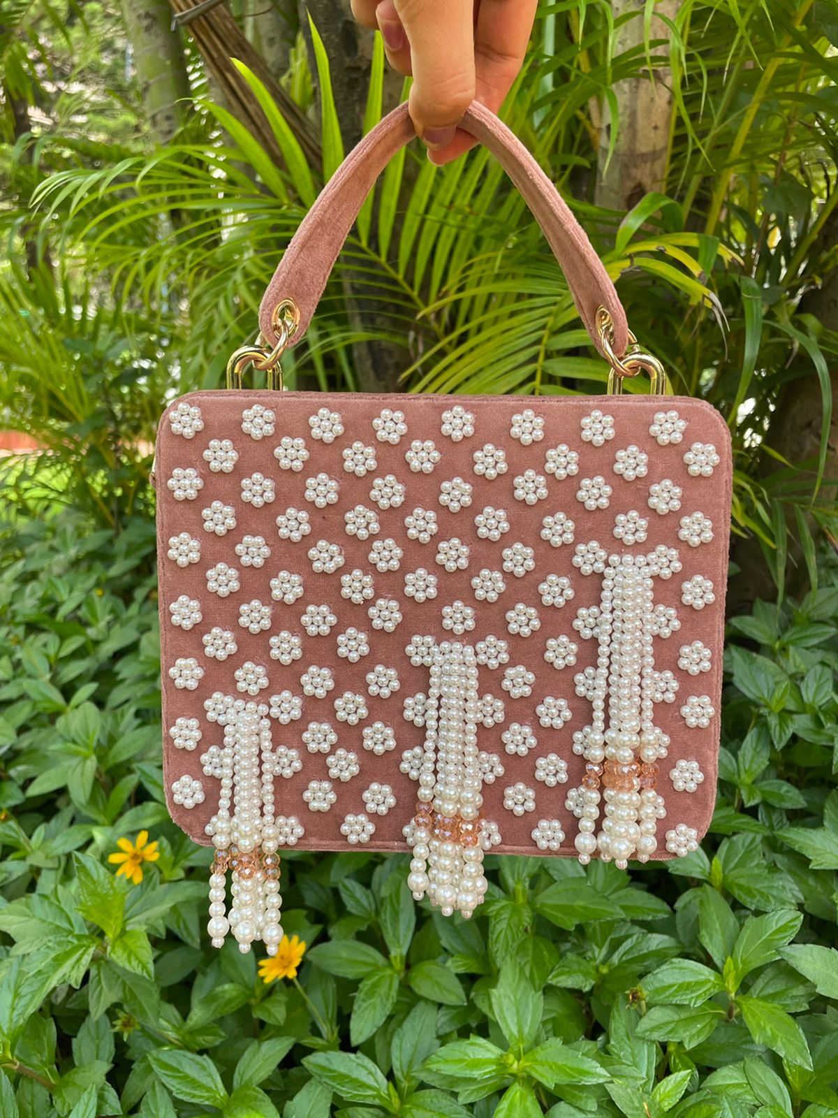 Suede suitcase handbag with hanging pearls