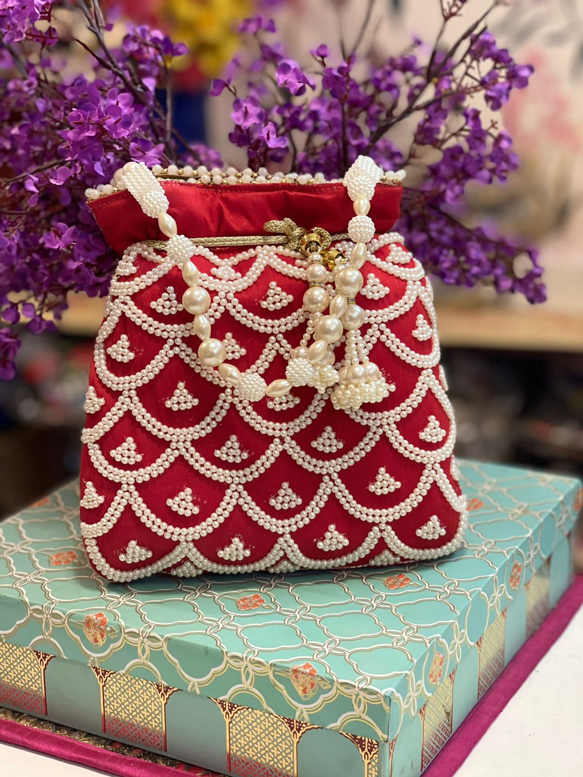 Pearl work potli bag with latkan