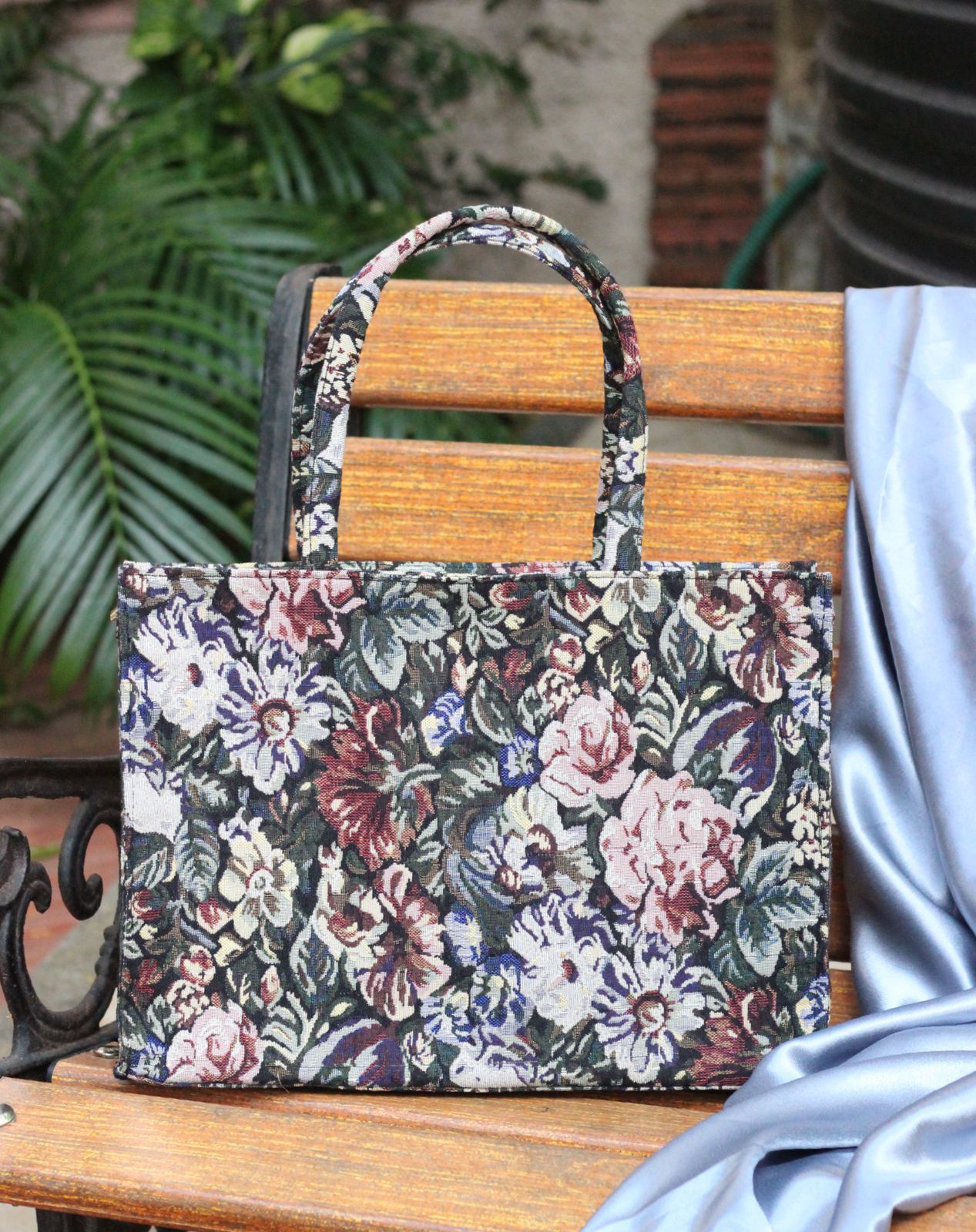 Handmade tote bag selling with bohemian-chic flower print