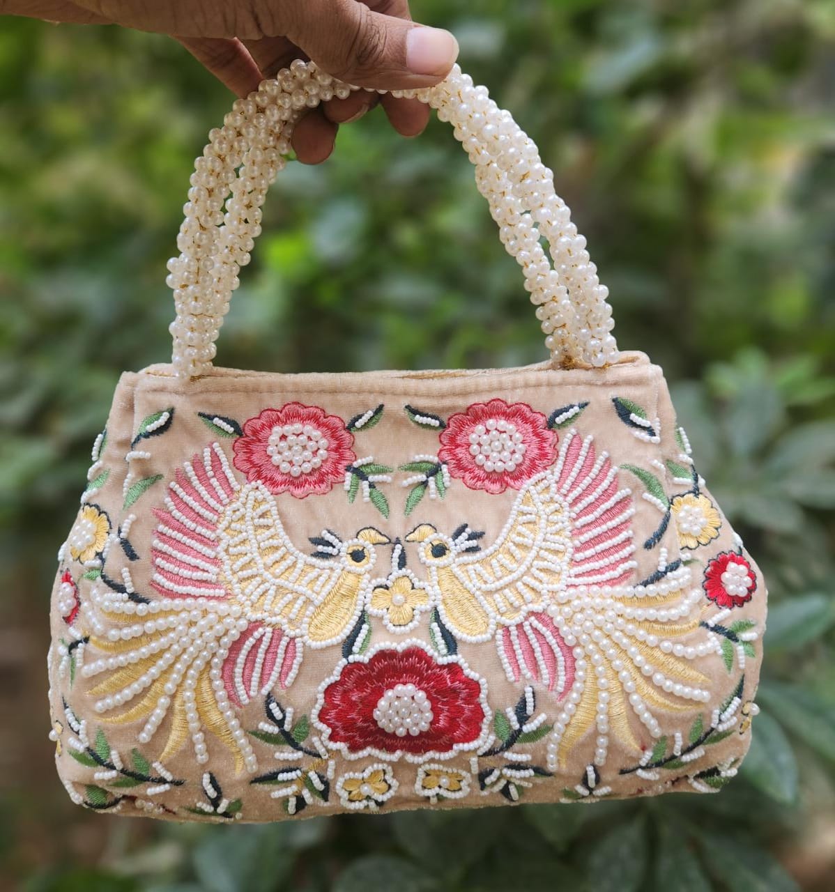 Bird embroidery handwork potli with pearl handle