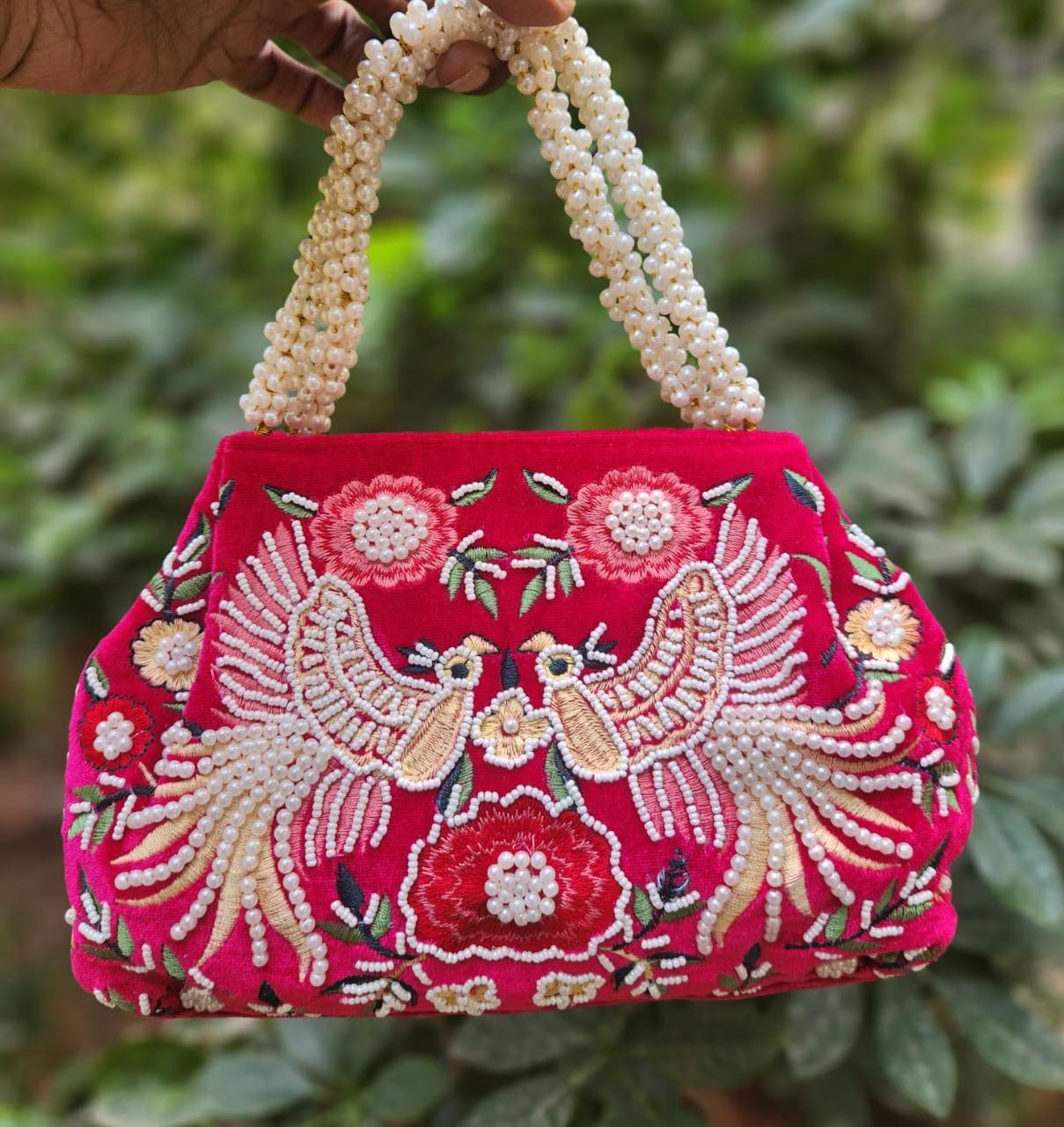 Bird embroidery handwork potli with pearl handle