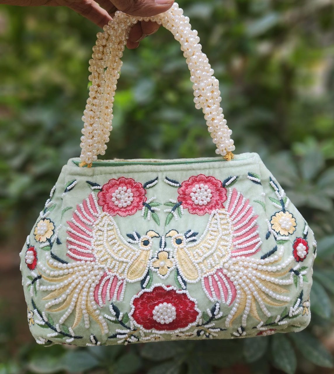 Bird embroidery handwork potli with pearl handle