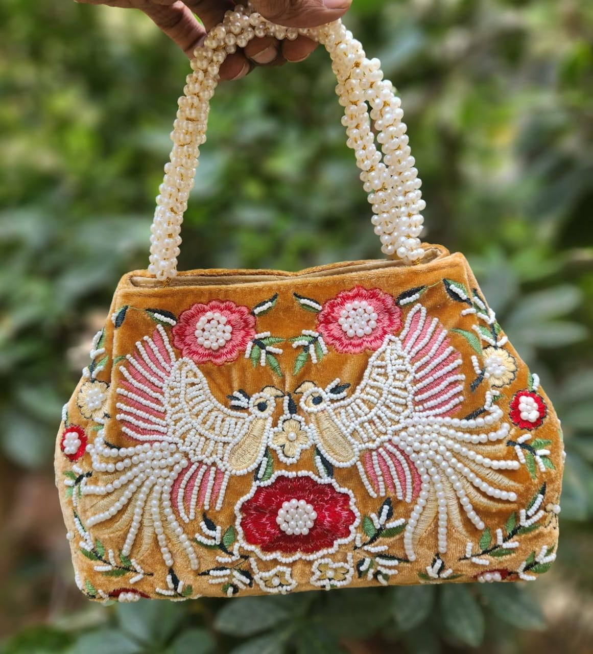 Bird embroidery handwork potli with pearl handle