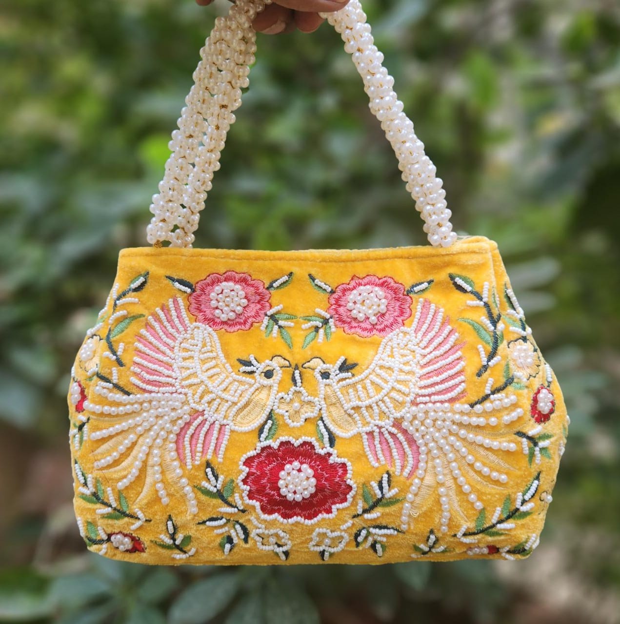 Bird embroidery handwork potli with pearl handle