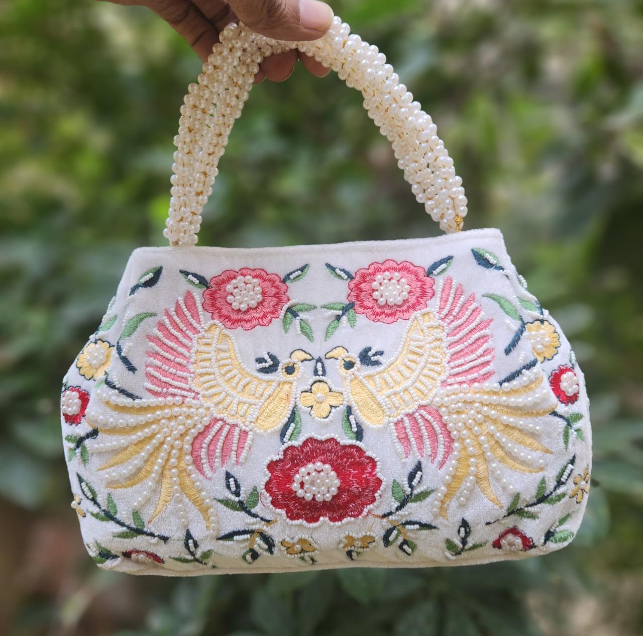 Bird embroidery handwork potli with pearl handle