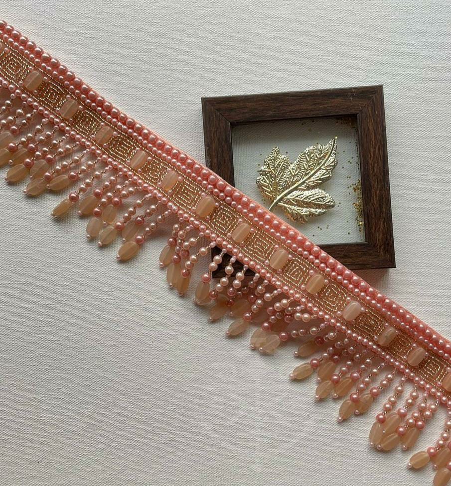 Peach and golden pearl work waistbelt with tassels