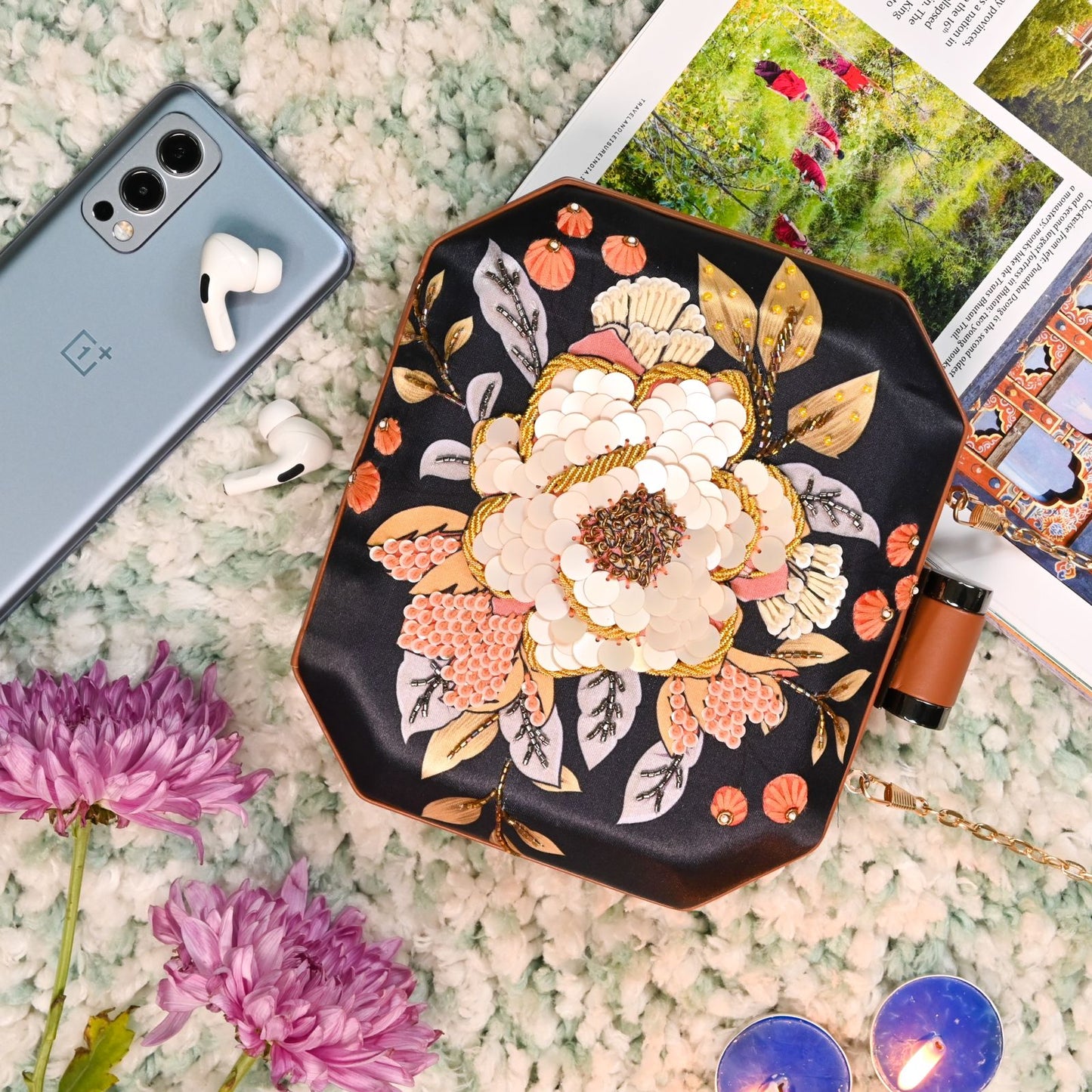 Black printed clutch with peach sequins & embroidered flower