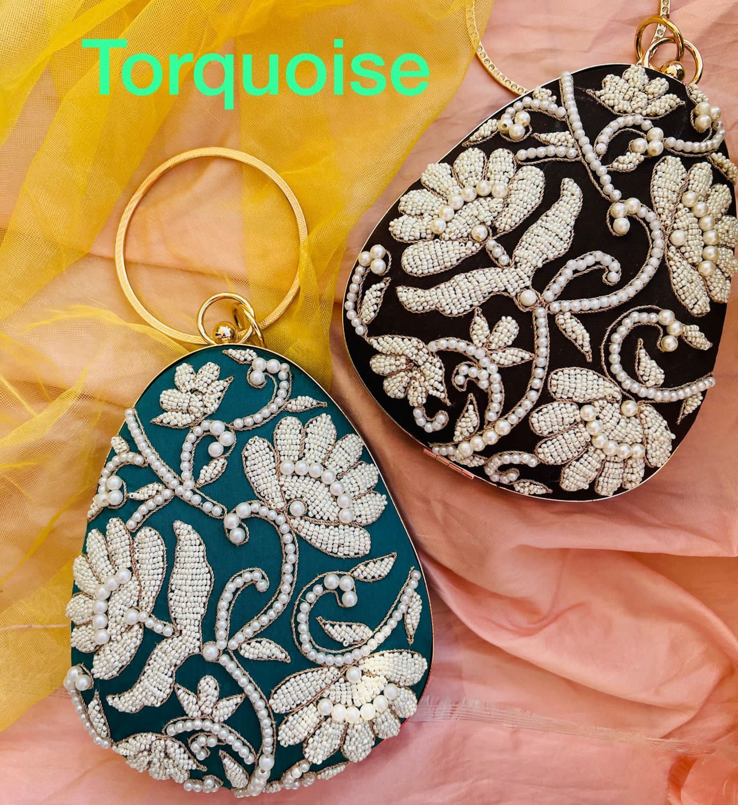 Oval clutch with pearl work and bangle